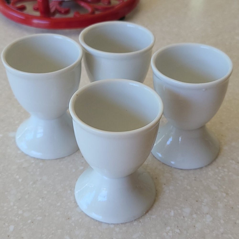 Ceramic egg holders and spoons